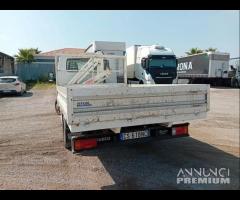 Iveco 35c14 con gru cc. 3000 cassone fisso