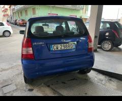 Kia picanto 1.1 benz optional