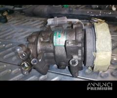 Compres clima NISSAN MICRA 1461cc diesel del 2004