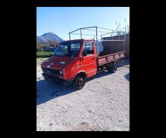 IVECO CON CASSONE