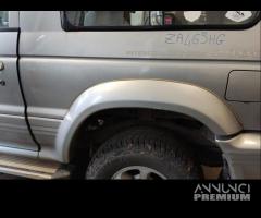 Modanatura post sinistra MITSUBISHI PAJERO 1997