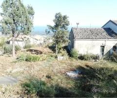 Terreno panoramico con fabbricato da demolire