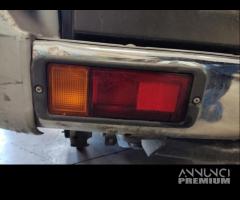 Fanale post sx paraurti MITSUBISHI PAJERO 1998