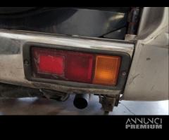 Fanale post dx paraurti MITSUBISHI PAJERO 1998 - 1