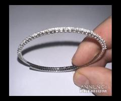 BRACCIALE MANETTA SEMIRIGIDO ORO 18kt. E DIAMANTI