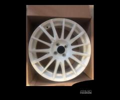 CERCHI NUOVI RAGGIO 17 POLLICI OPEL Corsa D 4 bolt