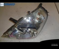 Faro ant sx KIA CARNIVAL III '07