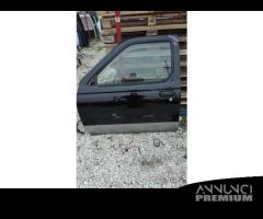 NISSAN NAVARA PORTE ANT E POST 2001 - 1