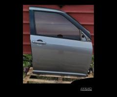 Suzuki swift porta ant e post dx e sx 2005-2010 - 1