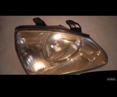 FARO ANTERIORE SX, DX KIA CARENS 2001 - 2