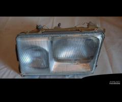 FARO ANTERIORE SX MERCEDES-BENZ 200 1985-1989