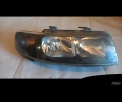 FARO ANTERIORE SX, DX SEAT LEON 2002