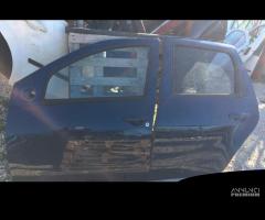 DACIA DUSTER PORTA ANT E POST DX E SX 10-17