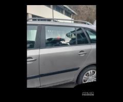 Porta posteriore sinistra Skoda Fabia 5J sw 2010