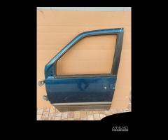 Porta anteriore sinistra Nissan Vanette del 1998