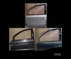 Porta anteriore sinsitra Chrysler Voyager del 02 - 1