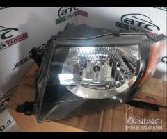 Faro Sx nuovo Originale Mitsubishi Pajero Pinin