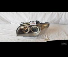 BMW SERIE 1 E87  FANALE ANTERIORE SINISTRO XENON