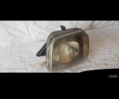 SUZUKI JIMNY FARO ANTERIORE SINISTRO KOITO10032081