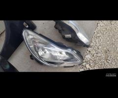 OPEL CORSA D RESTYLING MUSO COFANO FARI PARAFANGHI - 18