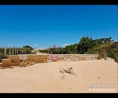 Tre fontane terreno fronte mare "dune di puzzite