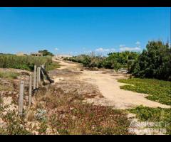 Tre fontane terreno fronte mare "dune di puzzite