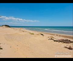 Tre fontane terreno fronte mare "dune di puzzite - 12