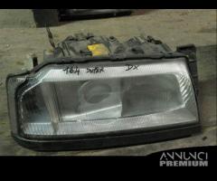 Faro fanale alfa 164