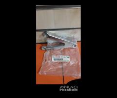 -Supporto pedana ant. Dx Yamaha R1