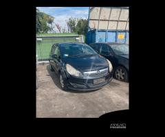 musata opel corsa paraurti cofano fari