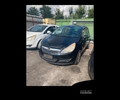 musata opel corsa paraurti cofano fari