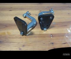 Staffe pedane da riposo per Harley Sportster