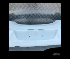 PARAURTI POSTERIORE OPEL CORSA D (06-11)