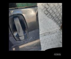 PORTA POSTERIORE SINISTRA RENAULT TRAFIC (00-13)