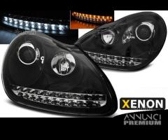 Fari anteriori xenon porsche cayenne 03-07 led