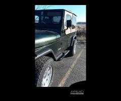 Pedane tubolari sottoporta JEEP Wrangler