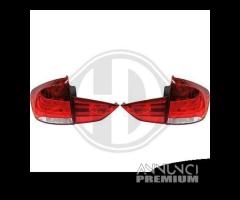 Coversione Set Di Fari BMW X1 (E84) 09-12