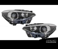 BMW Serie 1 (F20 F21) 11-15 fari Angel Eyes Lente - 1