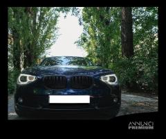 BMW Serie 1 (F20 F21) 11-15 fari Angel Eyes Lente