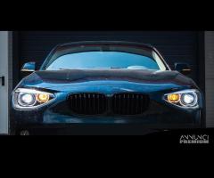 BMW Serie 1 (F20 F21) 11-15 fari Angel Eyes Lente - 6