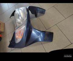 scudo anteriore e faro Suzuki Burgman 400 - 3