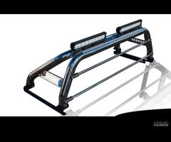 Nissan Navara D40 Roll bar inox con protez.cabina