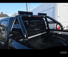 Nissan Navara D40 Roll bar inox con protez.cabina - 10