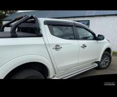 Mitsubishi L200 2015>19 Roll Bar inox con prot.cab