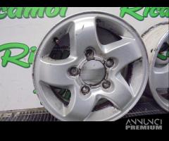 CERCHI IN LEGA SPORTAGE JA 15 X 6 ET 45 2001 - 5