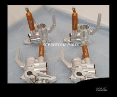 Piedini radiali cnc per t max con forcelle ohlins