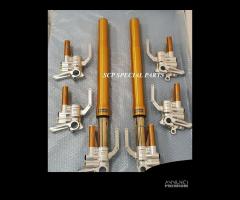 Piedini radiali cnc per t max con forcelle ohlins