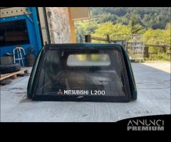 Copertura cassone Mitsubishi L200 1999 4 porte