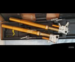 FORCELLE OHLINS CON PIEDINI SPECIALI RICAVATI CNC