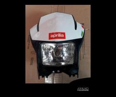 Aprilia RXV 450 07 :  faro devio chiavi maschera